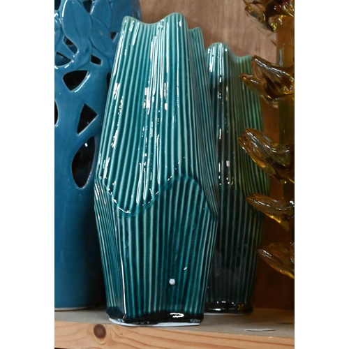 33 - # A pair of large glass vases applied with pinched frills, 29 cm high, to/w three blue-glazed earthe... 