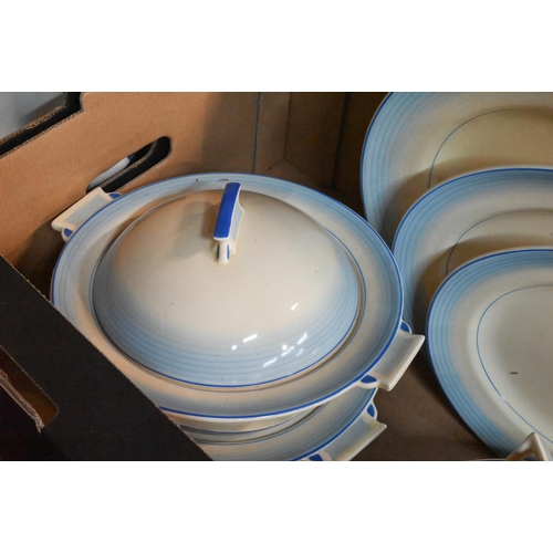 39 - # An Art Deco Royal Doulton pottery part dinner service with blue banded rims, to/w a Royal Cauldon ... 