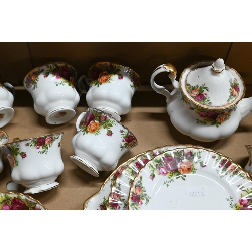 55 - A Royal Albert 'Old Country Roses' tea service for six, including tea pot and sandwich plate (box)