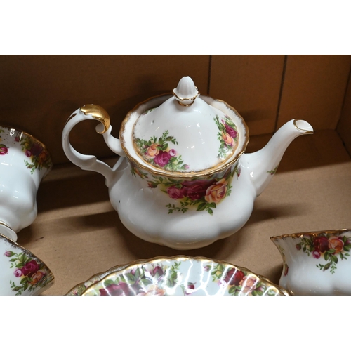 55 - A Royal Albert 'Old Country Roses' tea service for six, including tea pot and sandwich plate (box)