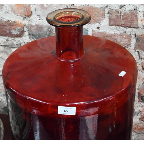 65 - A red glass cylindrical carboy, 45 cm high