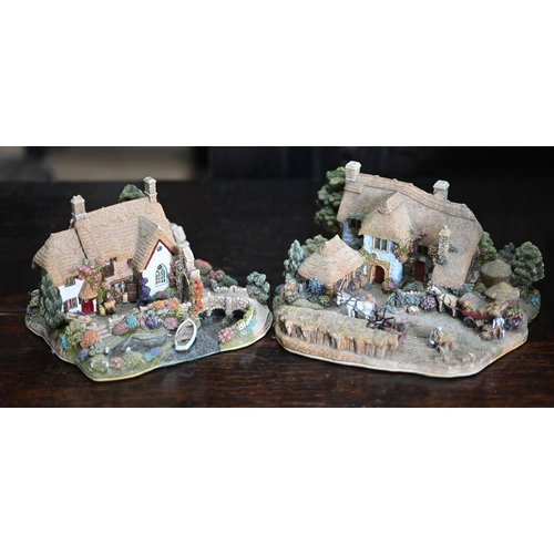 84 - A collection of twenty-five Lakeland Studios resin framed relief villages and houses (three boxed) t... 