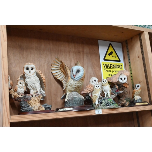 85 - Fourteen various resin owl ornaments