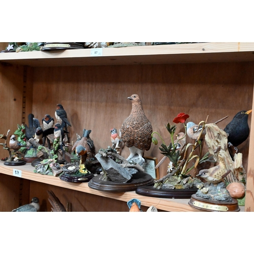 87 - A large quantity of resin bird ornaments (36 approx)