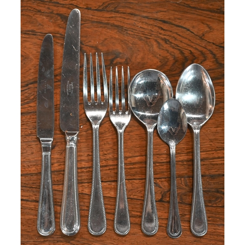 89 - A canteen of stainless steel bead-edge flatware and cutlery