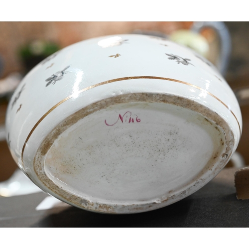 9 - A Regency Newhall part tea service with floral-painted decoration, inscribed beneath 'No. 46', in ma... 