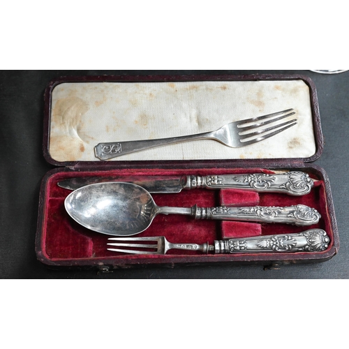 94 - A cased George IV silver three-piece Christening set, Birmingham 1827 a/f, to/w a silver fork, a can... 