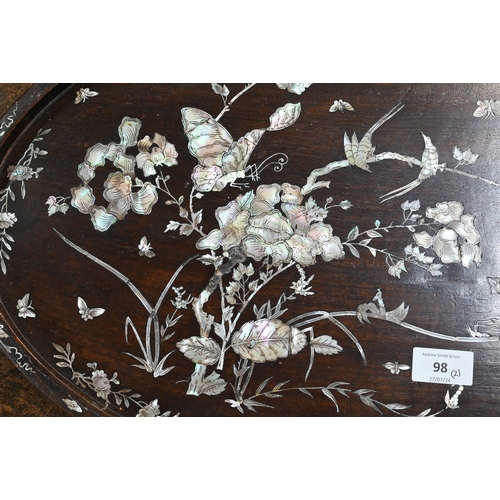 98 - A Chinese oval rosewood tray richly inlaid with mother of pearl flowers, birds and insects, 54 x 34.... 