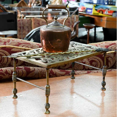 390 - # An antique brass rectangular trivet, brass toasting fork and a small copper kettle (3)