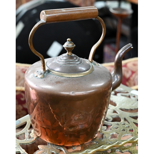 390 - # An antique brass rectangular trivet, brass toasting fork and a small copper kettle (3)