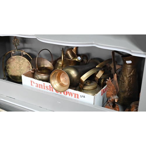 398 - # A collection of brass ware including a small table gong, kettles, jugs, scuttle to/w pair of carve... 