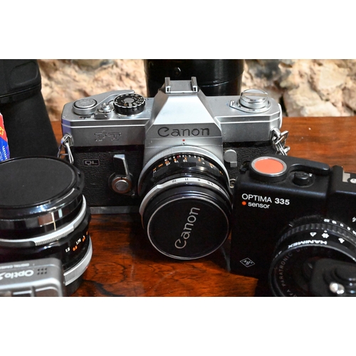 410 - Assorted vintage 35 mm camera equipment including; Olympus OM10 camera kit-bag with lenses and acces... 