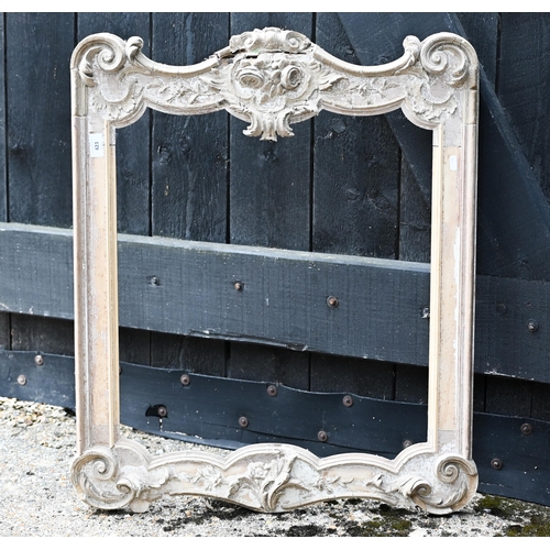 423 - An ornate lime wood picture frame (a/f) 82 cm x 66 cm o/a