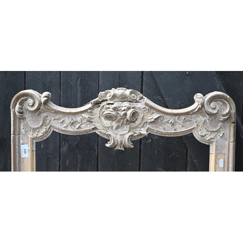 423 - An ornate lime wood picture frame (a/f) 82 cm x 66 cm o/a