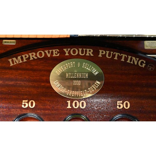 419 - In-PuTT - A hardwood cased 'Improve your Putting' set comprising putter, balls and 'holes', with pla... 