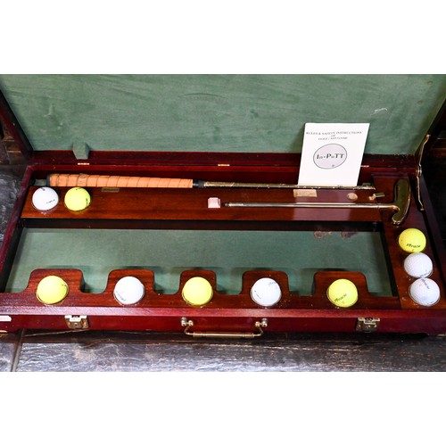 419 - In-PuTT - A hardwood cased 'Improve your Putting' set comprising putter, balls and 'holes', with pla... 