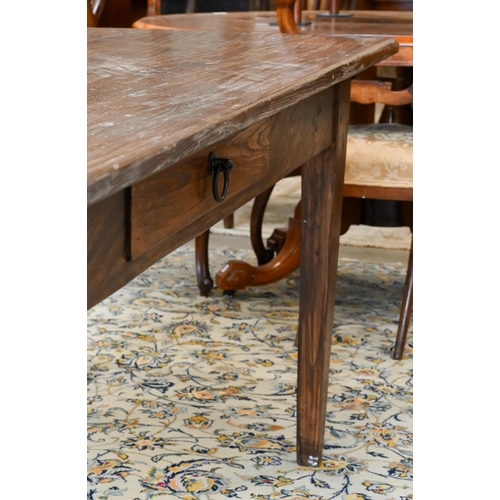 118 - An Italian provincial elm dining table (made to match previous lot), with drawer to one side, on tap... 