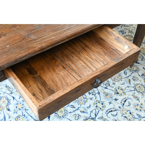 118 - An Italian provincial elm dining table (made to match previous lot), with drawer to one side, on tap... 