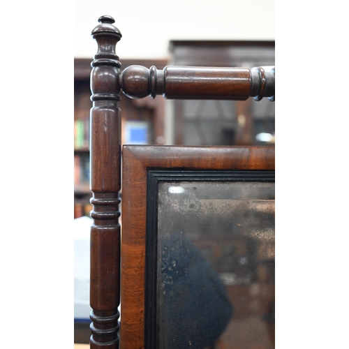 103 - A Regency mahogany toilet mirror, bevelled rectangular plate in turned frame from two drawer platfor... 