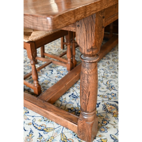 112 - An oak refectory dining table, jointed base with turned suports united by 'H' stretcher, 212 x 90 x ... 