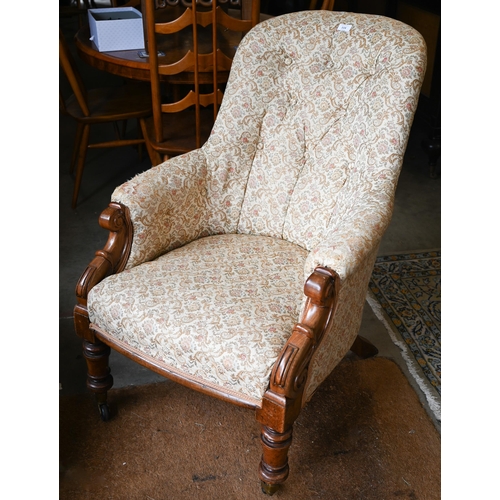 114 - Victorian mahogany framed button-back nursing chair, turned front legs and casters