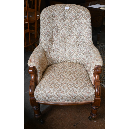 114 - Victorian mahogany framed button-back nursing chair, turned front legs and casters