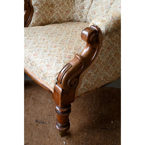 114 - Victorian mahogany framed button-back nursing chair, turned front legs and casters