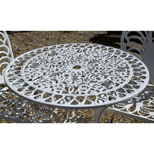 12 - A painted metal ciruclar terrace table 75 cm dia. x 70 cm high to/w pair of painted metal chairs