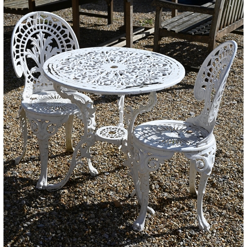 13 - A painted metal circular terrace table 70 cm dia. x 65 cm high to/w pair of painted metal chairs