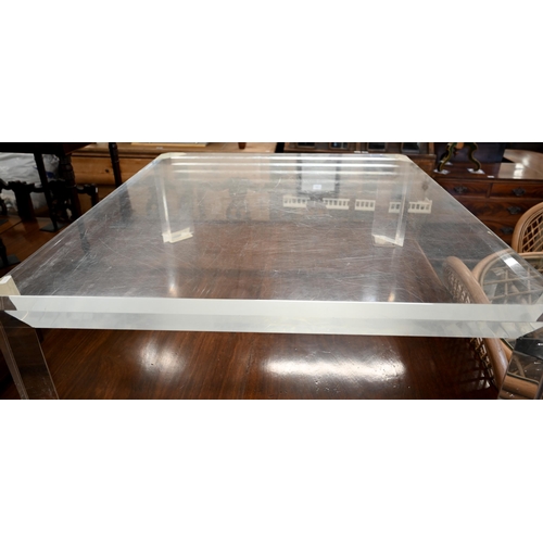 130 - A very heavy acrylic/perspex square coffee table with canted corners and bevelled design (scratched)... 