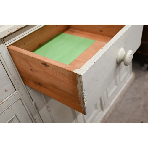 133 - Painted pine kitchen dresser, plate rack with three shelves on base with drawers and panelled cupboa... 