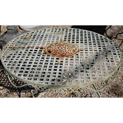 16 - A painted metal French bistro table with lattice top on folding base, 90 cm dia. to/w four black pow... 