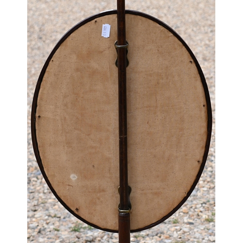 178 - A mahogany pole screen with glazed embroidered adjustable panel, 128 cm h