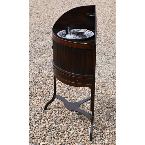 179 - A Mahogany corner washstand with sliding tambour panelled door and single drawer c/w Maling floral d... 