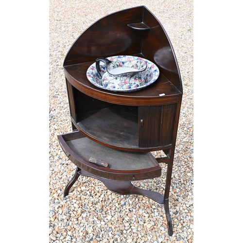 179 - A Mahogany corner washstand with sliding tambour panelled door and single drawer c/w Maling floral d... 