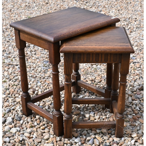 189 - An oak nest of two tables to/w Arts and Crafts oak jardiniere stand, oak side table on barley twist ... 