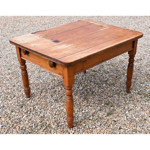 194 - A stained pine kitchen dining table with end drawer and turned supports, 90 cm x 110 cm x 74 cm h  (... 