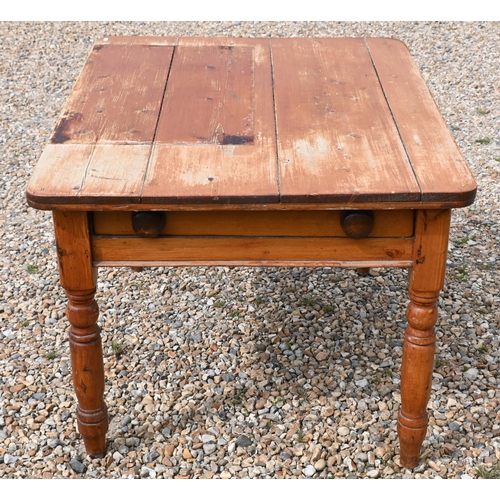 194 - A stained pine kitchen dining table with end drawer and turned supports, 90 cm x 110 cm x 74 cm h  (... 