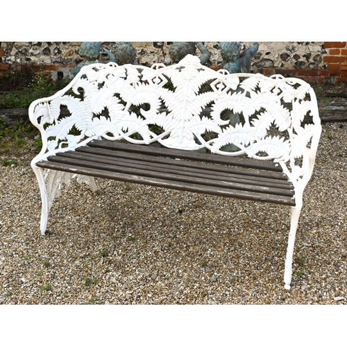 198 - A Coalbrookdale style cast iron fern design bench with teak slat seat, 146 cm