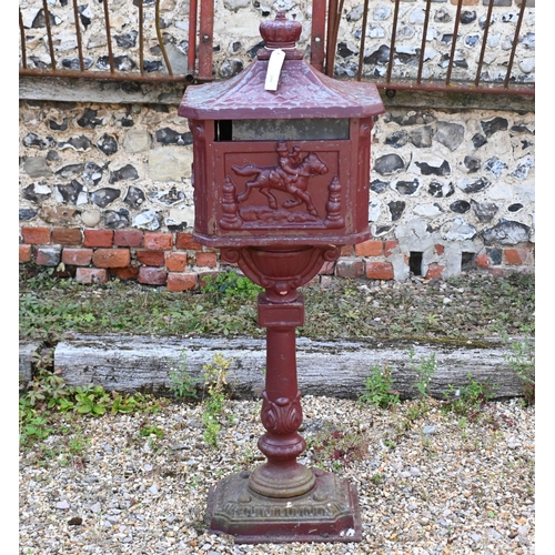 199 - A weathered metal domestic post-box, 110 cm h a/f