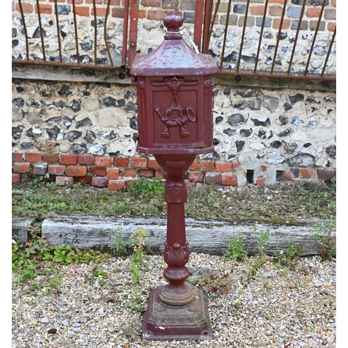 199 - A weathered metal domestic post-box, 110 cm h a/f