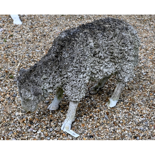 203 - A contemporary composite sculpture of a grazing sheep, 38 cm h