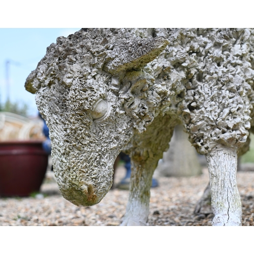 203 - A contemporary composite sculpture of a grazing sheep, 38 cm h