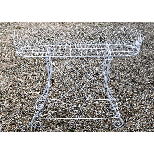 204 - A marble top cast iron 'Viking' table, 64 cm dia. x 74 cm h to/w a Victorian style wire plant stand ... 