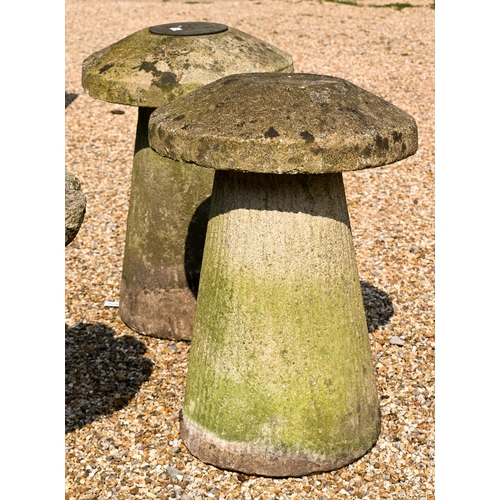 206 - Two composite stone staddle stones and caps, 66 cm h to/with a cast stone column birdbath and anothe... 