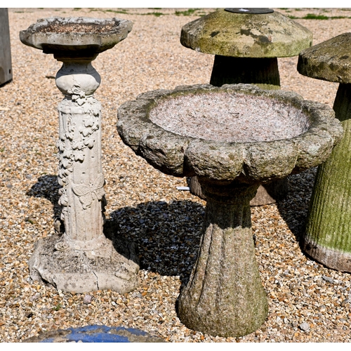 206 - Two composite stone staddle stones and caps, 66 cm h to/with a cast stone column birdbath and anothe... 