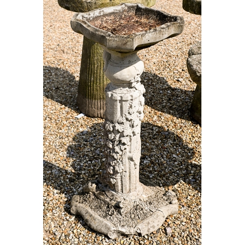 206 - Two composite stone staddle stones and caps, 66 cm h to/with a cast stone column birdbath and anothe... 