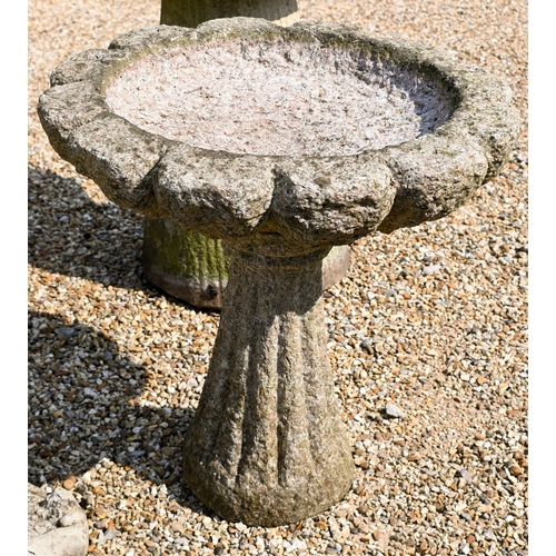 206 - Two composite stone staddle stones and caps, 66 cm h to/with a cast stone column birdbath and anothe... 