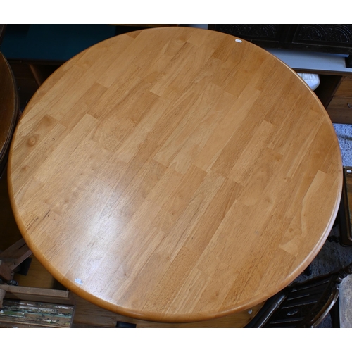 211 - A modern beechwood breakfast set comprising a circular table, 106 cm dia. x 74 cm h and set of four ... 