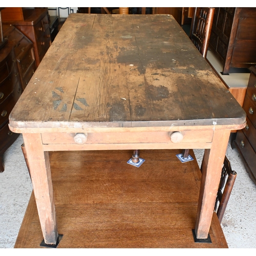 215 - A Victorian pine kitchen table, drawer to each end, 182 cm x 87 cm x 75 cm h, the surface stained an... 